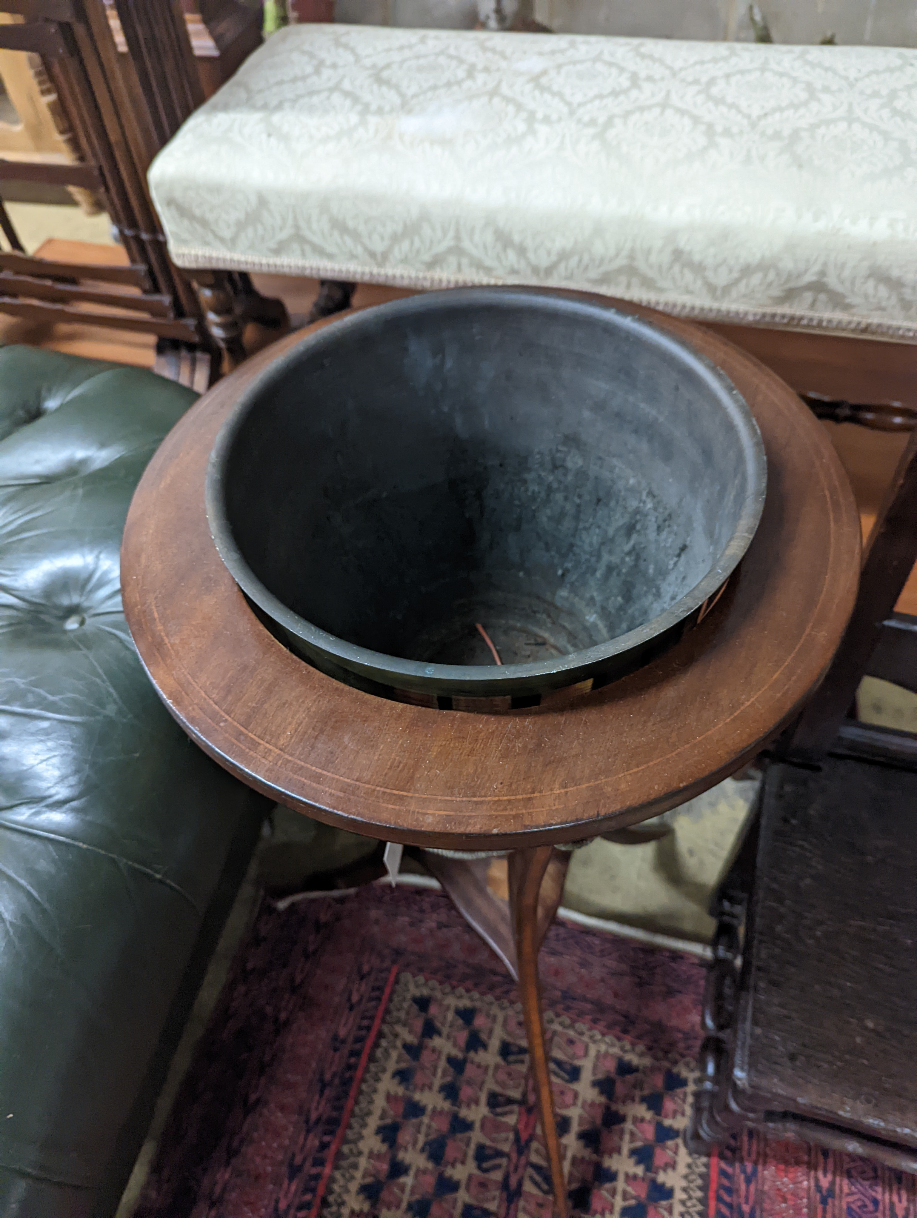 An Edwardian inlaid mahogany jardiniere with associated brass liner, height 92cm